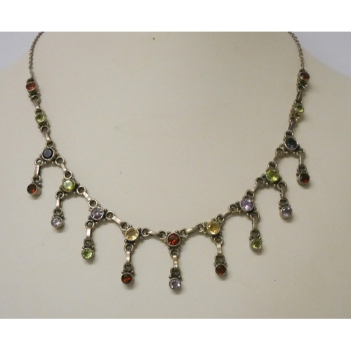 444 - A silver fringe necklace set with various coloured semi-precious gemstones and a pair of matching pi... 
