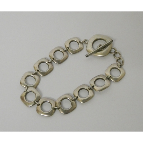 450 - A silver Tiffany bracelet of square open links