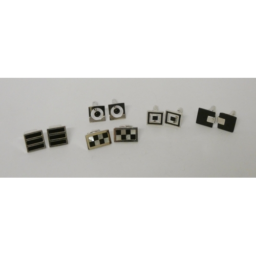 451 - Five pairs of modern silver and onyx panel cuff links.