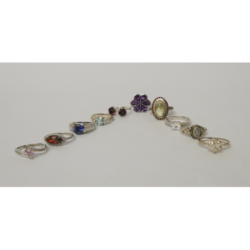 452 - Ten ladies silver stone set dress rings.