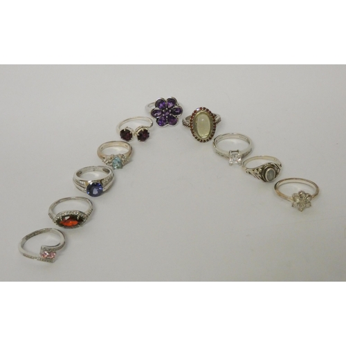 452 - Ten ladies silver stone set dress rings.