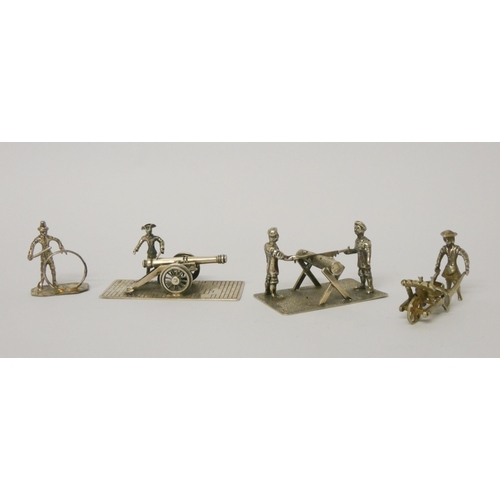 489 - Miniature novelties - soldier firing a cannon, lumberjacks, rickshaw vendor etc.