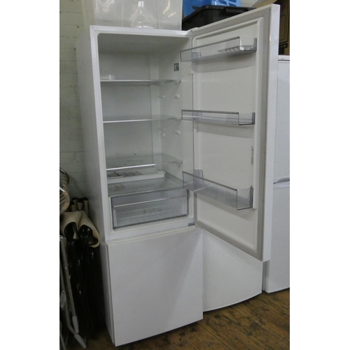 655 - A tall Beko fridge/freezer with larger fridge compartment on top