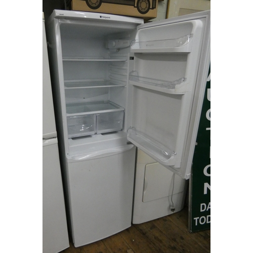 657 - A tall Hotpoint half and half fridge/freezer