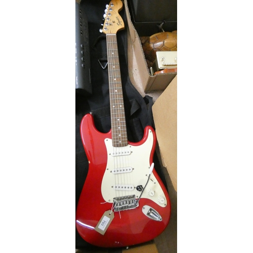 703 - A Squire electric guitar