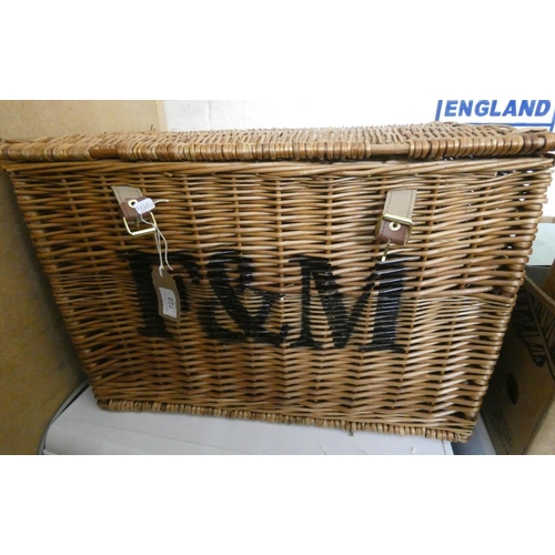 722 - An F&M wicker basket