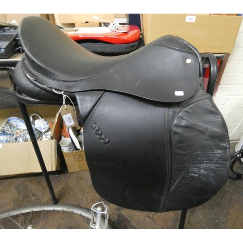 728 - A British black leather saddle with saddle rack