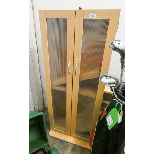 736 - A lightwood cabinet with glass doors, 4' tall together with a wall hanging cabinet with sliding glas... 