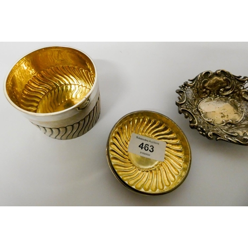 463 - A cylindrical silver tea caddy with gilded interior and a pierced silver bon bon dish. Gross weight ... 