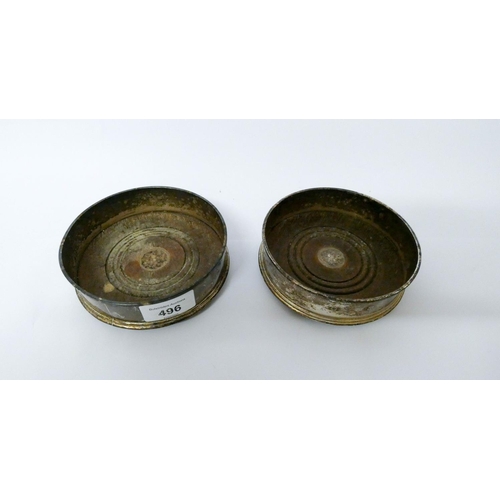 496 - A pair of modern silver bottle coasters, London 1988. 12.5 cms diameter