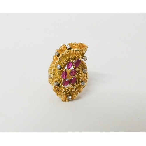 419 - A large ruby and diamond cocktail ring, in yellow gold. Ring size N, weight 15.6g