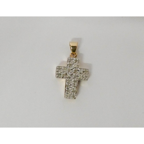 550 - A diamond cross pendant, pave set with brilliant cut diamonds of 0.25 carats, on 9ct yellow gold. 2.... 