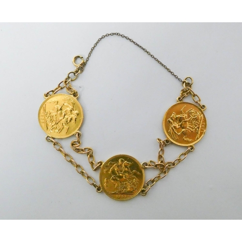 414 - A gold bracelet set with three full gold sovereigns - 1895, 1898 and 1908. Gross weight 28.9g