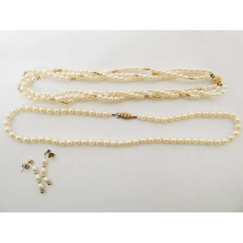 447 - A row of uniform cultured pearls on a 9ct gold and seed pearl set clasp and a modern twisted row of ... 