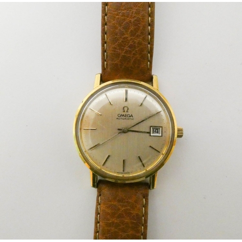 531 - Omega - gents vintage automatic dress watch, on brown leather strap, champagne dial with date apertu... 