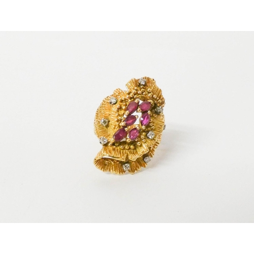 419 - A large ruby and diamond cocktail ring, in yellow gold. Ring size N, weight 15.6g
