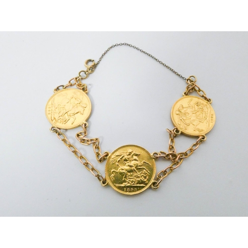 414 - A gold bracelet set with three full gold sovereigns - 1895, 1898 and 1908. Gross weight 28.9g