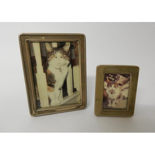 462 - Two small silver photograph frames, tallest measures 10cms