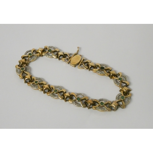 519 - An emerald and diamond bracelet, comprised of 9ct yellow gold openwork links 20cms long. Hallmarked,... 