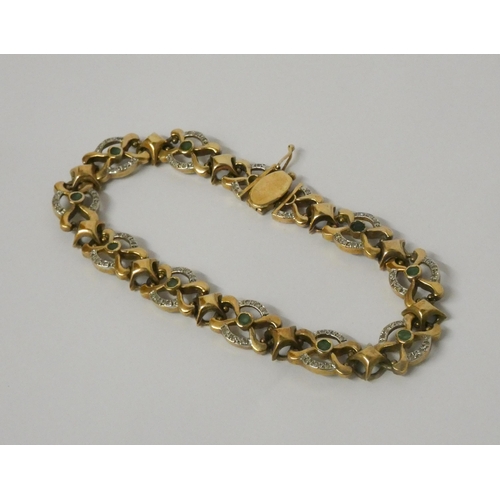 519 - An emerald and diamond bracelet, comprised of 9ct yellow gold openwork links 20cms long. Hallmarked,... 