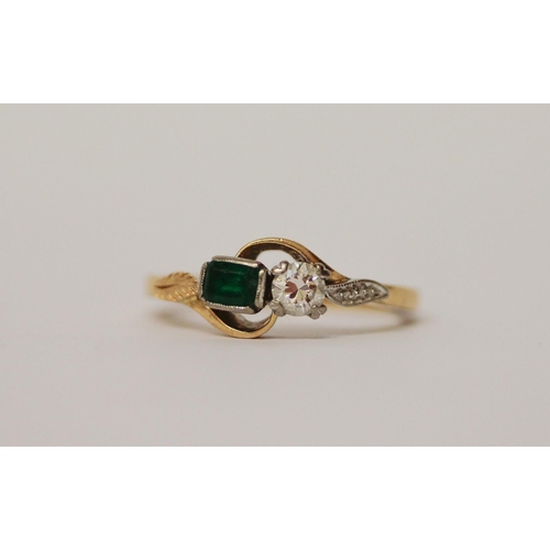 520 - An emerald and diamond two stone ring, on 18ct yellow gold band, marked 18ct, ring size M, 3.6g