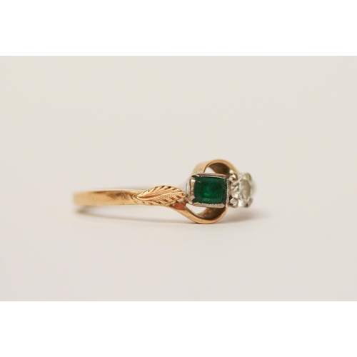 520 - An emerald and diamond two stone ring, on 18ct yellow gold band, marked 18ct, ring size M, 3.6g