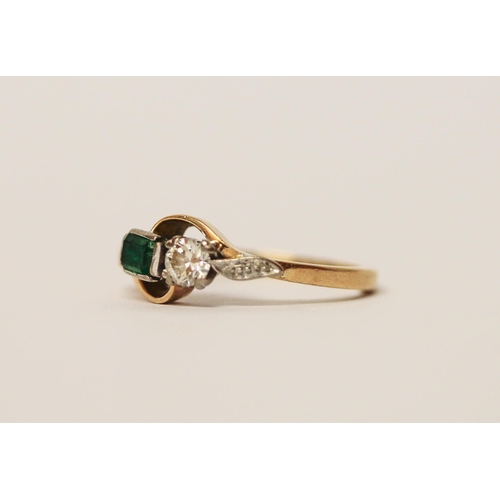 520 - An emerald and diamond two stone ring, on 18ct yellow gold band, marked 18ct, ring size M, 3.6g