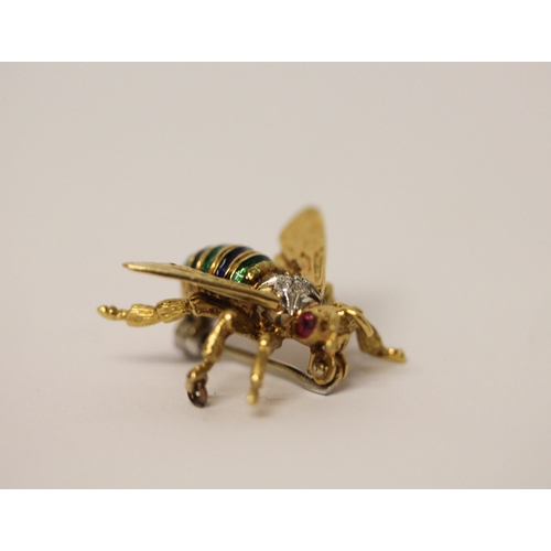 524 - An 18ct yellow gold and enamel bee brooch, with ruby eyes and diamond set body, hallmarked, gross we... 