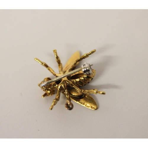 524 - An 18ct yellow gold and enamel bee brooch, with ruby eyes and diamond set body, hallmarked, gross we... 