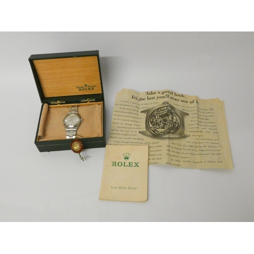 529 - Rolex - gent's vintage Oyster Perpetual stainless steel wristwatch, with box and guarantee.