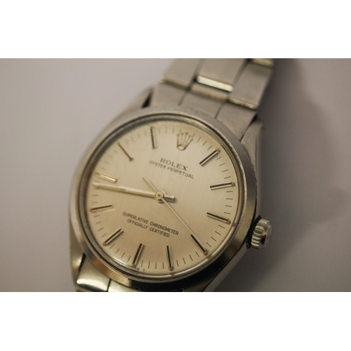 529 - Rolex - gent's vintage Oyster Perpetual stainless steel wristwatch, with box and guarantee.