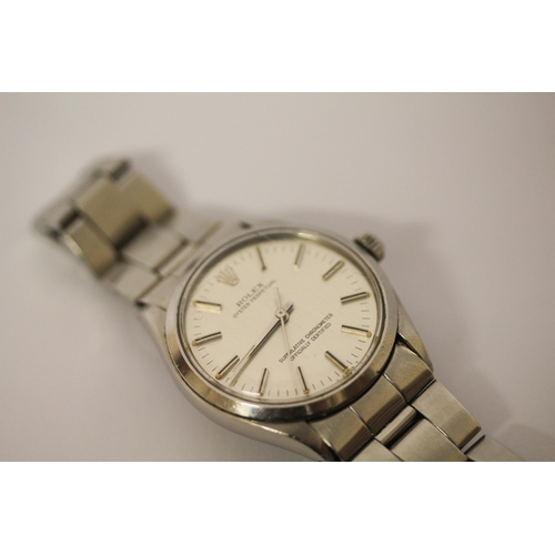 529 - Rolex - gent's vintage Oyster Perpetual stainless steel wristwatch, with box and guarantee.