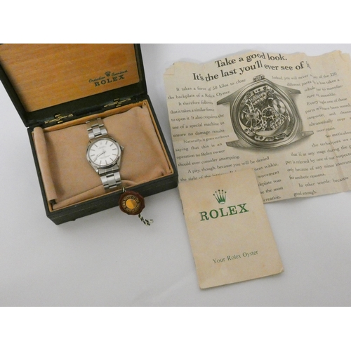 529 - Rolex - gent's vintage Oyster Perpetual stainless steel wristwatch, with box and guarantee.