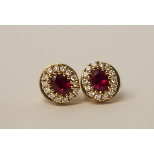 569 - A pair of ruby and diamond cluster ear studs, in 18ct yellow gold, posts hallmarked, 2.2 g