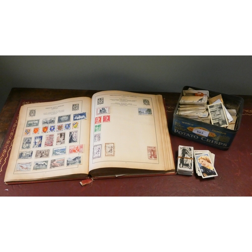 583 - A Stand stamp album and contents and a collection of tea and cigarette cards