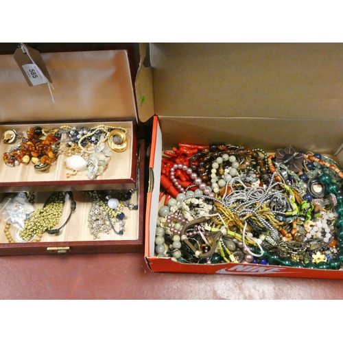 585 - A large quantity of assorted costume jewellery, some contained within a canter levered jewellery box