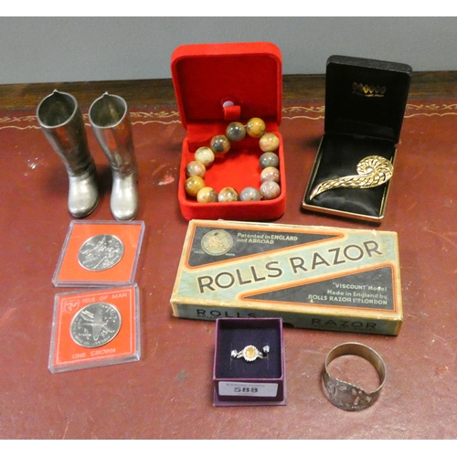 588 - Silver napkin ring, riding boots pen holders, agate beads, silver dress ring, Rolls razor