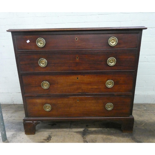 1 - A Georgian mahogany chest of four long drawers with brass ring handles, 38