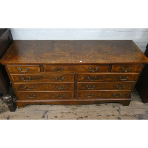 16 - A Georgian style long low walnut chest of six long and four short drawers with brass handles, 5' wid... 