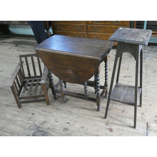 22 - An oval oak barley twist gate leg table, two tier oak plant pedestal and a child's chair