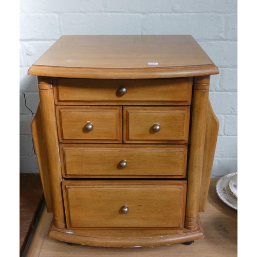 38 - A miniature pale mahogany chest of five assorted drawers with magazine rack sides, 15