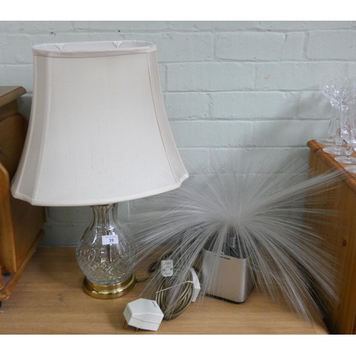 39 - A cut glass table lamp with shade and a fibre optic style lamp