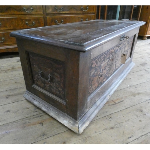 4 - An oak blanket chest with floral inlaid marquetry panels, 40