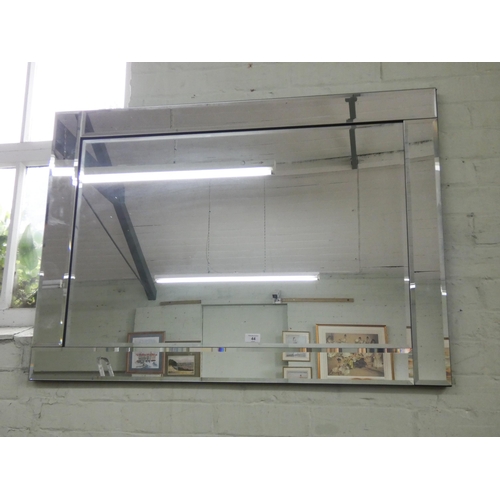 44 - A large bevelled mirror framed wall mirror, 3'6 x 2'6