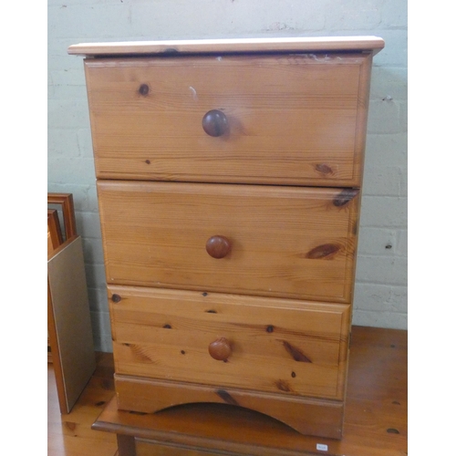 48 - A small modern pine sideboard fitted drawers and cupboards, 3' wide and a pine three drawer bedside ... 