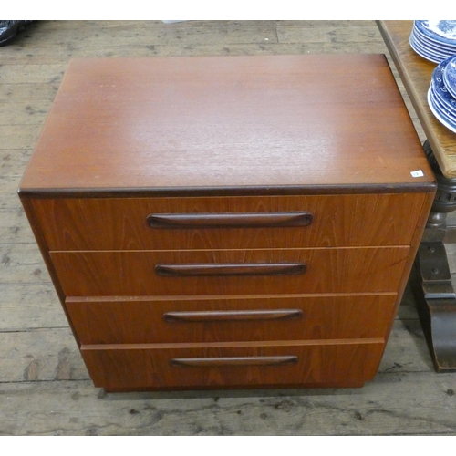 79 - A small GPlan teak chest of four long drawers, 28