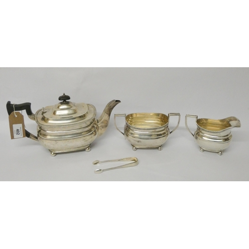 402 - A three piece silver tea service, Sheffield 1930's, William Hutton & Sons, with a pair of silver sug... 