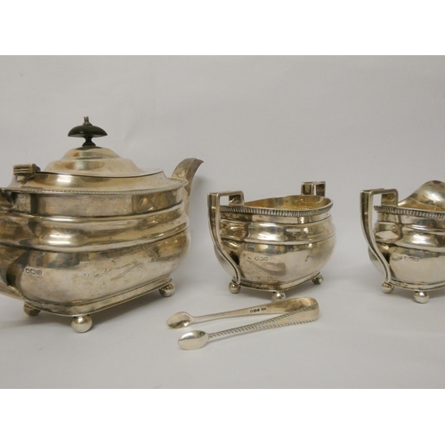 402 - A three piece silver tea service, Sheffield 1930's, William Hutton & Sons, with a pair of silver sug... 