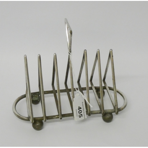 405 - A silver plated triangular toast rack, possible design by Christopher Dresser