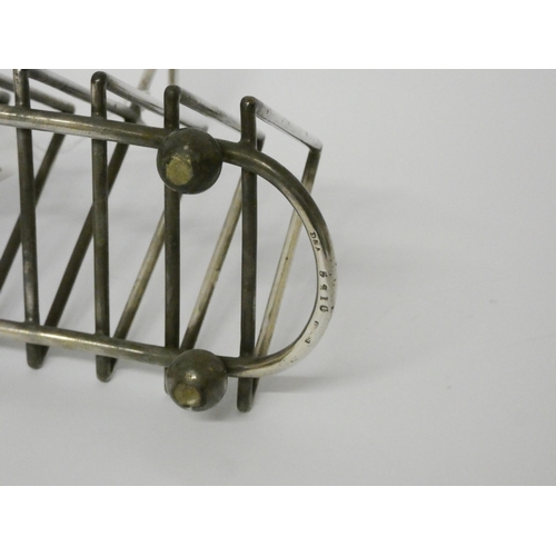 405 - A silver plated triangular toast rack, possible design by Christopher Dresser